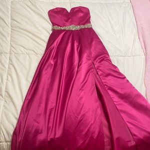 pink strapless, with a slit on the side, pockets